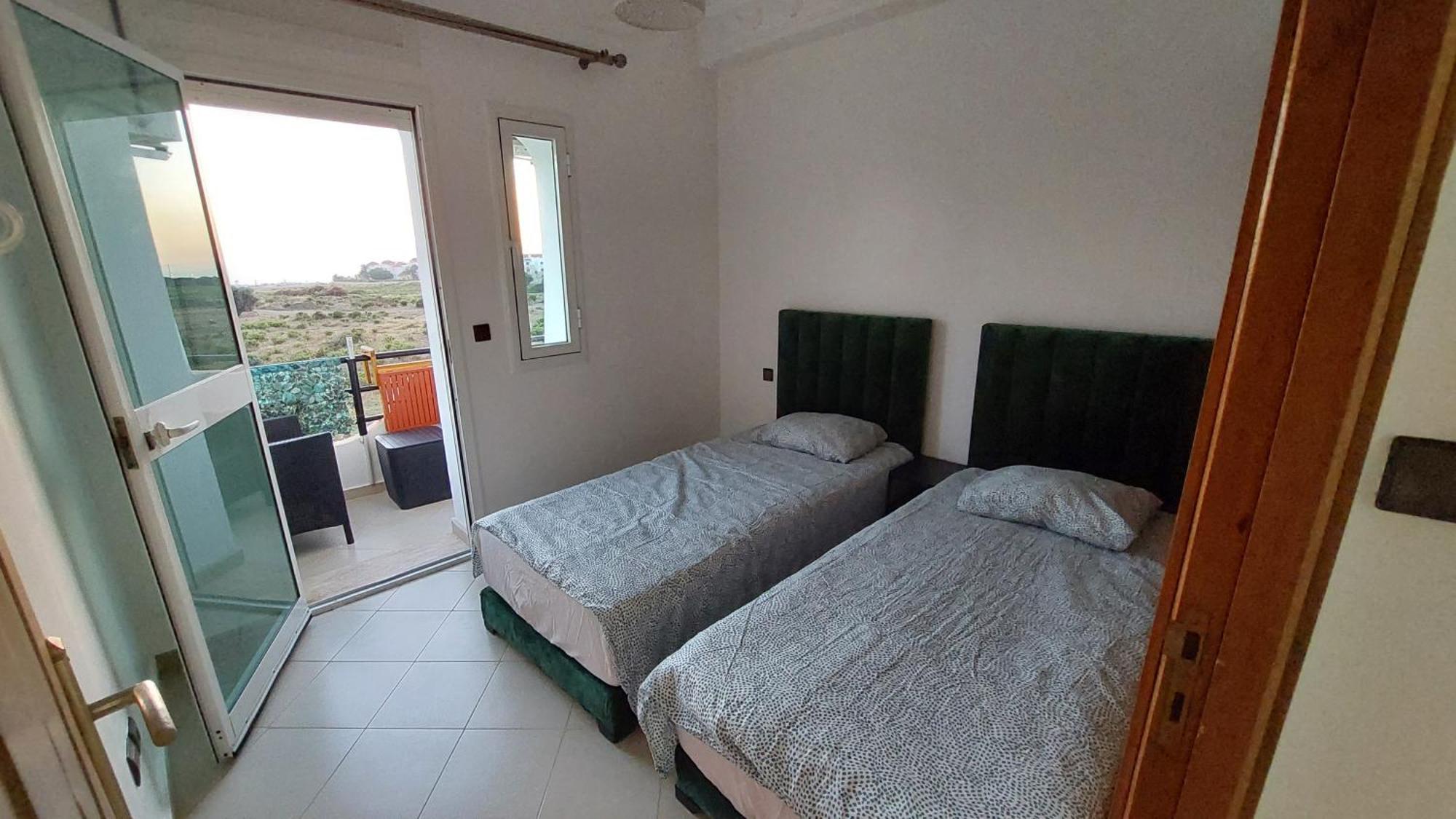Appartement Avec Piscines, Vue Sur Mer Et Acces A La Plage A Achakar Hill, Tanger. Exteriör bild
