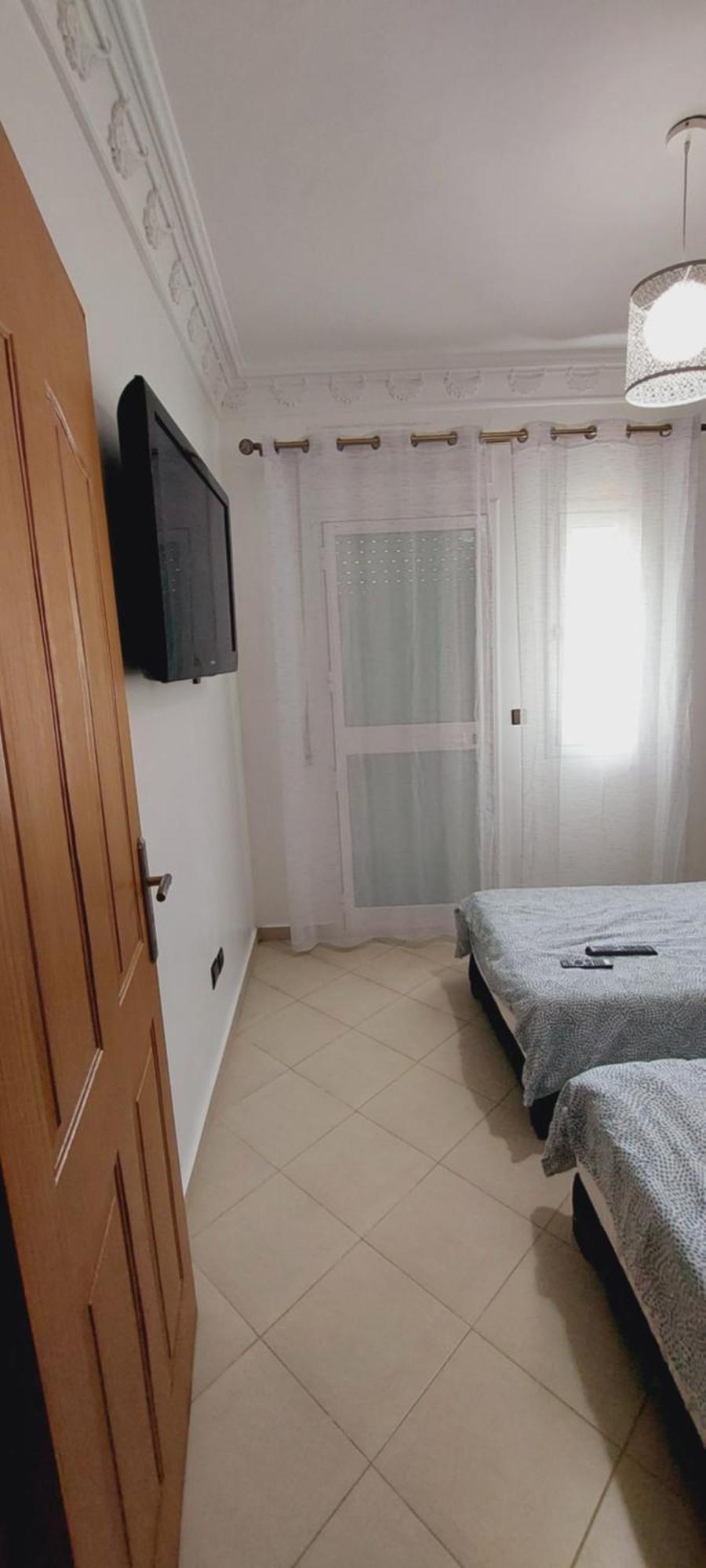 Appartement Avec Piscines, Vue Sur Mer Et Acces A La Plage A Achakar Hill, Tanger. Exteriör bild